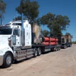 Pressure on Australia’s Freight Industry due to Diesel Price Increase The Fuel Crisis Has Hit Transport Hard Fuel prices in Australia are at record levels. Diesel is a major component of the freight industry, which relies heavily on it to operate long distance transport. Transport operators report that their expenses have increased dramatically since the tensions surrounding the Iran conflict drove global oil prices higher. The impact on businesses who rely heavily on heavy vehicles has been intense and immediate. The Government urges the public to reduce fuel consumption In a rare television message, Prime Minister Anthony Albanese spoke to the nation. He recognized the insecurity and asked that citizens limit their fuel consumption where they could. He encouraged the public to take advantage of public transportation so as to ensure that there is fuel available for industries and services that are essential but cannot do without driving. Truck operators struggle to stay afloat The message is not a comfort to many people in the transportation sector. Businesses are finding it difficult to keep up with rising costs. A driver explained that in order to remain afloat, he spends a lot of time on his finances. He tracks his income, tyres and fuel costs. Filling up a tank on a truck used to cost about A$3,600. The same tank filling costs around A$7.500. The sharp rise in operating costs has reduced profits and doubled the cost of doing business. Long routes add more pressure Companies that operate in remote locations face greater challenges. Some trucks cross the Nullarbor plain, an isolated and vast stretch of land. The route connects Ceduna with Norseman. There are few fuel stations and long distances between them. Some drivers are forced to travel 200km without fuel in some regions. Fuel planning is critical in these conditions. Fuel planning is critical in these conditions. Industry stability threatened by rising costs Diesel prices are continuing to rise, putting pressure on transport. Now, many businesses wonder how much longer they will be able to continue in this environment. If fuel prices are not stable, there may be delays or closures of freight companies. It could have a negative impact on supply chains, and raise costs for all consumers.