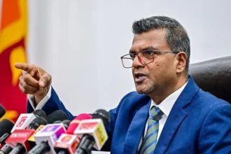 Sri Lanka Launches Investigation After Cyber Theft of 2.5 Million Dollars Cyber fraud uncovered in sovereign debt payment system Sri Lankan authorities have started a formal investigation after hackers breached finance ministry systems and diverted 2.5 million dollars from a scheduled debt payment to Australia. Officials say the transfer was part of a bilateral repayment arrangement linked to a settlement planned for September 2025. The issue came to light only after the Australian side reported that the payment had not been received. How the money was diverted Investigators believe the attackers targeted the debt payment process by manipulating instructions sent through email communication channels. This allowed them to redirect funds into unauthorized bank accounts instead of the intended recipient. Authorities suspect the breach happened in January, but the discovery was delayed for several months. Officials also noted that the hackers attempted a similar manipulation during a later payment related to India. That attempt raised further suspicion and helped uncover irregularities in banking details. Government action and internal suspensions Harshana Suriyapperuma, secretary of the finance ministry, confirmed that four senior officers from the Public Debt Management Office have been suspended as part of the investigation. The government is now working with international law enforcement partners to trace the stolen funds and identify those responsible. Deputy finance minister Anil Jayantha Fernando stated that the case became clearer after repeated attempts to alter payment instructions triggered internal reviews. Economic background adds pressure This cyber incident comes at a sensitive time for Sri Lanka, which is still recovering from a severe financial crisis in recent years. The country previously struggled with a major foreign currency shortage that disrupted imports of fuel, food, and medicine. Sri Lanka later defaulted on a large portion of its external debt, estimated at 46 billion dollars. The crisis led to widespread public protests and major political changes in 2022. International coordination underway Australian officials confirmed they are aware of the issue and are supporting Sri Lanka’s investigation. Both countries are now coordinating to track the diverted funds and secure future payment systems. Authorities in Colombo have also increased warnings about cyber scams, especially those targeting financial and government institutions.