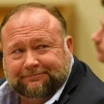 Legal Dispute Background A new twist emerges as The Onion shifts toward transforming Infowars into a platform built on satire. Amid legal battles, Alex Jones confronts steep financial consequences due to misinformation surrounding the Sandy Hook tragedy. Years passed before Jones acknowledged the incident actually happened. Though he claimed his earlier statements fell within legal rights to speak freely, judges did not accept this reasoning. Compensation was awarded to grieving relatives after rulings found harm in false claims. Legal decisions ultimately sided firmly with those who lost loved ones. Bankruptcy and Asset Liquidation By 2022, mounting legal challenges pushed Jones into bankruptcy. Well before summer of 2024, a ruling required selling off his private belongings to pay victim relatives. That decision came after a prior bid from The Onion to take over Infowars failed. Judges questioned how the sale was handled, noting it likely undervalued what could have been gained. Now contesting a decision that might lead to selling his business, Jones remains firm. Still, he insists the broadcast will carry on just as before. The Onion's Satirical Take Now shaping its next move, The Onion aims to acquire publishing access to Infowars outlets. By doing so, it could introduce parody pieces designed to confront conspiracy narratives and false digital claims. For half a year, the deal stands active - potentially longer if renewed. Fictional figures appear under Ben Collins’ leadership, shaped by outlandish plots. Mockery drives the approach: mimicking internet influencers pushing false claims or risky wellness tips. If the court gives approval, proceeds from the project might support families of Sandy Hook victims, Collins pointed out. What Happens Next Though the plan awaits official sign-off, Jones insists on pushing back. What happens next could redefine Infowars’ path - alongside court approaches to media outlets spreading false claims.