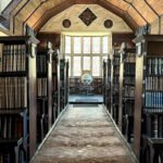A 750-Year-Old Library That Still Tells Its Story The Merton College Library is more than a place for books. It is a piece of living history that dates back over seven centuries. Founded in 1276 this remarkable library existed long before the Aztec Empire even began. I find it amazing that it has been around for long. In its days books were stored in a locked chest instead of on shelves. A few people had access to it. Three key-holders had to come to unlock it. Books were not easy to replace then. Each one was written by hand, which took months to do. That made them very valuable. How the Library Began The librarys roots go back to a rule set by the Archbishop of Canterbury in the century. The college fellows had to donate books. This simple rule helped build one of the academic collections in England. I think it's cool how a simple rule led to something big. At that time libraries looked very different. There were no rows of shelves or casual browsing. Instead books were carefully. Loaned out through a formal process. The community would gather when access was needed which made reading a shared activity. People would come together to read and discuss books. A Legacy That Spans Generations Over the centuries the Merton College Library has served notable figures. Scholars from the century studied there. Later famous writer J.R.R. Tolkien also used its resources. The librarys long history even stretches across global events like the Black Death and the COVID-19 pandemic. I am amazed by its continuity. This uninterrupted use makes the Merton College Library unique. Few institutions can claim such a history. Why Its History Matters Today During the period many believed it was the oldest library in England. Some even claimed it was the oldest in the world. Today historians take a careful view. They say defining a "library" is not simple. Early collections developed in stages and not all looked like libraries. Still Mertons collection remains special. Its long survival, traditional systems and cultural impact make it stand out. Today it offers a glimpse, into how knowledge was preserved and shared in the medieval world. The Merton College Library is a treasure that continues to tell its story.