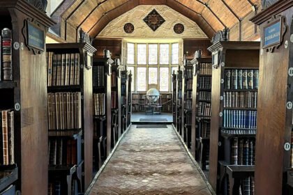 A 750-Year-Old Library That Still Tells Its Story The Merton College Library is more than a place for books. It is a piece of living history that dates back over seven centuries. Founded in 1276 this remarkable library existed long before the Aztec Empire even began. I find it amazing that it has been around for long. In its days books were stored in a locked chest instead of on shelves. A few people had access to it. Three key-holders had to come to unlock it. Books were not easy to replace then. Each one was written by hand, which took months to do. That made them very valuable. How the Library Began The librarys roots go back to a rule set by the Archbishop of Canterbury in the century. The college fellows had to donate books. This simple rule helped build one of the academic collections in England. I think it's cool how a simple rule led to something big. At that time libraries looked very different. There were no rows of shelves or casual browsing. Instead books were carefully. Loaned out through a formal process. The community would gather when access was needed which made reading a shared activity. People would come together to read and discuss books. A Legacy That Spans Generations Over the centuries the Merton College Library has served notable figures. Scholars from the century studied there. Later famous writer J.R.R. Tolkien also used its resources. The librarys long history even stretches across global events like the Black Death and the COVID-19 pandemic. I am amazed by its continuity. This uninterrupted use makes the Merton College Library unique. Few institutions can claim such a history. Why Its History Matters Today During the period many believed it was the oldest library in England. Some even claimed it was the oldest in the world. Today historians take a careful view. They say defining a "library" is not simple. Early collections developed in stages and not all looked like libraries. Still Mertons collection remains special. Its long survival, traditional systems and cultural impact make it stand out. Today it offers a glimpse, into how knowledge was preserved and shared in the medieval world. The Merton College Library is a treasure that continues to tell its story.