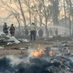 Explosion in Kerala Firecracker Unit Kills Thirteen During Festival Preparations Incident Details A powerful explosion hit a firecracker making unit in Thrissur, Kerala, in southern India. Thirteen workers lost their lives in the blast. Around forty workers were inside a cluster of sheds preparing fireworks for an upcoming Hindu festival. The explosion was so strong that people living several kilometers away felt it. Some residents thought it was an earthquake. Nearby homes also suffered damage due to the blast. Casualties and Rescue Efforts Emergency teams and local residents rushed to the site right after the explosion. They helped pull injured workers and bodies from the damaged sheds. Several people were injured in the incident. Officials confirmed that five of them are in critical condition and receiving treatment in hospitals. Link to Thrissur Pooram Festival The workers were preparing fireworks for the Thiruvambady Temple, one of the main participants in Thrissur Pooram. This is a major annual temple festival in Kerala known for its large fireworks displays. The fireworks are usually prepared in designated units that operate with permission for festival use. Large crowds gather every year to watch the final fireworks show during the festival. Safety Concerns and Past Incidents Firecracker factories in India have faced repeated safety issues over the years. Similar accidents have occurred in nearby regions, including Tamil Nadu, where a recent explosion killed many people. The industry is often linked with poor safety conditions, especially during peak festival production periods. Workers handle explosive materials in tightly packed sheds, which increases risk. Cause Still Under Investigation Officials have not confirmed the exact cause of the explosion. Some local authorities suggested that high temperatures may have contributed to the blast. However, investigators say the cause is still unclear and under review. Authorities are also checking how many workers were present at the time and whether safety rules were properly followed.