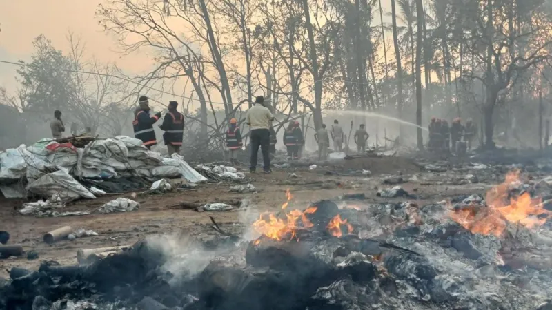 Explosion in Kerala Firecracker Unit Kills Thirteen During Festival Preparations Incident Details A powerful explosion hit a firecracker making unit in Thrissur, Kerala, in southern India. Thirteen workers lost their lives in the blast. Around forty workers were inside a cluster of sheds preparing fireworks for an upcoming Hindu festival. The explosion was so strong that people living several kilometers away felt it. Some residents thought it was an earthquake. Nearby homes also suffered damage due to the blast. Casualties and Rescue Efforts Emergency teams and local residents rushed to the site right after the explosion. They helped pull injured workers and bodies from the damaged sheds. Several people were injured in the incident. Officials confirmed that five of them are in critical condition and receiving treatment in hospitals. Link to Thrissur Pooram Festival The workers were preparing fireworks for the Thiruvambady Temple, one of the main participants in Thrissur Pooram. This is a major annual temple festival in Kerala known for its large fireworks displays. The fireworks are usually prepared in designated units that operate with permission for festival use. Large crowds gather every year to watch the final fireworks show during the festival. Safety Concerns and Past Incidents Firecracker factories in India have faced repeated safety issues over the years. Similar accidents have occurred in nearby regions, including Tamil Nadu, where a recent explosion killed many people. The industry is often linked with poor safety conditions, especially during peak festival production periods. Workers handle explosive materials in tightly packed sheds, which increases risk. Cause Still Under Investigation Officials have not confirmed the exact cause of the explosion. Some local authorities suggested that high temperatures may have contributed to the blast. However, investigators say the cause is still unclear and under review. Authorities are also checking how many workers were present at the time and whether safety rules were properly followed.