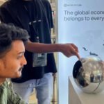 Tinder, Zoom and Tinder users can now be verified by using eye scans Tinder and Zoom have launched a new system of identity that relies on iris scans to verify whether or not a person is human. This feature is intended to help reduce the number of fake accounts, bots and AI-generated identities, which are increasingly difficult to detect on the internet. After the eye scan, users receive a badge that says "Proof of Humanity". The badge is displayed on the user's profile to prove that they are a genuine person. The Iris Scan system works The user can verify their identity using a mobile application or an orb-shaped scanner. This scans captures the colored portion of the eye, the iris. After the scanner is approved, a digital ID called World ID will be created. The ID can be stored in the phone of the user and used on all supported platforms. World Network Behind the Technology Worldcoin, formerly known as Worldcoin, is the source of this technology. The technology is being developed by Tools for Humanity. Sam Altman co-founded and chairs the startup, which also runs OpenAI. As online content grows increasingly automated, the company claims that this system will separate human accounts from AI-driven ones. Why platforms are adopting it Tinder is facing a problem of fake profiles and fraudulent accounts. These accounts often use AI to create convincing images and conversation to fool users. Match Group which is Tinder's owner, added video self-portrait checks. This new option to scan your iris is intended to provide a more robust level of security. Zoom also faces a new risk. The DeepFake Technology has enabled people to pretend to be real during video chats, such as executives or coworkers. Growing Concerns About AI Scams The use of deepfake fraud is on the rise. One reported case from Hong Kong involved a worker being tricked by AI-generated fakes into sending $25 million. In the next few years, AI-driven fraud may cause losses of tens or even hundreds of millions of dollars. The Next Step World ID will allow Tinder and Zoom to scan their iris and verify identity if desired. These companies claim that this will help to restore trust when it comes to online interactions, where AI impersonation has become more prevalent.