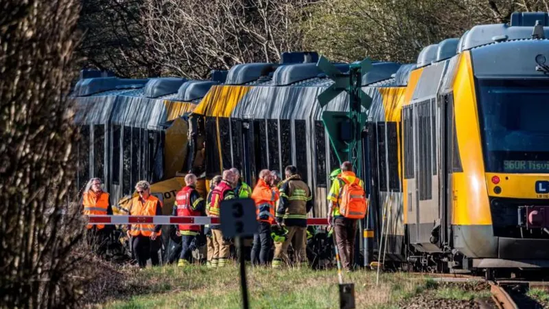 Head-on Train Collision Near Copenhagen Leaves Multiple Injured Crash Location and Time A serious train collision happened early Thursday morning in North Zealand, Denmark, between Hillerød and Kagerup, around 40 km northwest of Copenhagen. The accident occurred at 06:29 local time on a railway line that serves commuters, students, and workers in the region. Casualties and Emergency Response According to police and medical officials, 37 passengers were on board the two trains. Five people were critically injured, while 13 others sustained minor to moderate injuries. Emergency teams quickly responded and transported the injured to nearby hospitals, including air evacuation for the most serious cases. Fire and rescue services reached the scene shortly after the crash was reported. Authorities confirmed that several railway staff members were also injured in the incident. What Officials Know So Far Investigators have not yet confirmed the cause of the collision. The Danish Accident Investigation Board is working alongside police to determine what went wrong. Early assessments suggest multiple possible causes, including a signalling system failure or human error. Officials have stressed that it is too early to draw conclusions. Local and National Reaction The mayor of Gribskov municipality described the incident as deeply distressing and said the injured included local residents who regularly use the line for daily travel. Danish Prime Minister Mette Frederiksen expressed serious concern over the accident and said she was closely monitoring developments. Rail operator Lokaltog called the crash one of the most severe incidents the railway sector can face. The company confirmed that it is gathering technical data to support the investigation. Investigation Continues Specialists from the national railway safety authority arrived at the site during the morning hours. They are examining track systems, signalling data, and operational records to understand how two trains ended up on a collision path. Authorities have emphasized that all possibilities remain open while the investigation is ongoing.