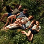 Royal Couple Celebrate 15 Years of Marriage Prince William and Catherine, Princess of Wales, marked their 15 years of marriage by sharing a new family portrait on social media. The couple posted a heartfelt image with a simple heart emoji and a caption celebrating their anniversary. The photo shows the royal family relaxed on grass during an Easter break in Cornwall. Photographer Matt Porteous captured the moment. Family Moment in Cornwall In the image, William and Catherine smile alongside their children, Prince George, Princess Charlotte, and Prince Louis. Their family dog also appears in the portrait. The setting reflects a calm and personal family moment away from official duties. Wedding and Early Life Together The couple married at Westminster Abbey in London in 2011 in a global televised ceremony. They first met while studying at the University of St Andrews. After their wedding, they spent their early married years in Anglesey. Prince William trained there as an RAF search and rescue pilot. He later reflected positively on that period, saying he valued the experience, the work, and the strong sense of teamwork. Growing Family Over the Years Prince George was born in 2013, marking the couple’s first child. Princess Charlotte followed two years later, and Prince Louis was born in 2018. The family has since become one of the most followed royal households in the world.