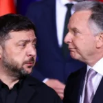 Zelensky Criticizes U.S. Diplomacy Disregard shown, says Volodymyr Zelensky, toward Ukraine as American diplomats choose Moscow over Kyiv. With visits unfolding in Russia while skipping the capital of Ukraine, irritation mounts. Peace efforts appear lopsided, seen through Kyiv’s lens. Attention shifts unequally, feeding discontent among Ukrainian leadership. Diplomacy feels unbalanced when one city receives envoys, another does not. On multiple occasions, US representative Steve Witkoff journeyed to Moscow, engaging in talks with Russian leader Vladimir Putin. Despite such meetings, a formal trip to Kyiv remains unfulfilled by him - similarly absent for Jared Kushner. Though contact exists at high levels elsewhere, Ukraine has not received their presence officially. The pattern continues without public explanation. Should talks be needed, Zelensky noted, Kyiv could accept them elsewhere. Meetings away from Ukraine might happen, given complications. Yet, when decisions touch Ukraine, presence in person holds weight. Engagement without participation lacks substance. Peace Efforts Slow as World Tensions Rise By late 2025, movement toward a truce began accelerating. Talks between American and Russian representatives explored an arrangement to halt hostilities. Still, certain conditions appeared disadvantageous from Kyiv's perspective. Eventually, Ukraine sought a place at the negotiation table. Following that, talks emerged with participation from every party involved. Come 2026, agreement appeared between Kyiv and Moscow on select military matters. Among these were arrangements about frontline locations alongside oversight mechanisms. Speed decreased shortly afterward. Attention turned elsewhere due to events in the Middle East. Involvement of American and Israeli forces targeting Iran diverted resources. Focus on Ukraine weakened as a result. Some Problems Still Prevent Deal Still, key disputes show no sign of closing. From the start of conflict, Moscow has removed minors - Kiev insists they come back. On another front, leadership shifts in Ukraine are a condition pushed by Russian officials. The main issue lies ahead, focused on Donbas. Control of eastern Ukrainian territories remains a goal for Moscow. This request meets firm resistance from Kyiv. Compromise appears distant between both parties. A step toward agreement appears distant, according to a Ukrainian representative. Despite repeated efforts, progress stalls because viewpoints differ sharply. One position faces another without movement. Dialogue continues, yet outcomes remain unchanged. Ukraine Awaits Continued U S Backing Even so, collaboration with the United States remains central for Zelensky. While recognizing changes in worldwide focus, he noted Kyiv continues to place weight on ties with Washington. Now taking part in discussions about Iran, American diplomats remain absent from Kyiv. Their involvement clarifies the reason, yet fails to calm unease among Ukrainians.