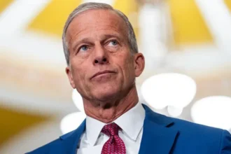 Thune rejects compensation fund plan John Thune has openly questioned a new compensation fund linked to the Trump administration. He said he is not convinced the plan has a clear purpose. He also expressed doubts about how it would work in practice. The $1.8 billion fund is intended to compensate people who were allegedly unfairly investigated in earlier administrations. What the IRS deal includes The plan is part of a wider agreement tied to a legal dispute involving Donald Trump and the Internal Revenue Service. Under the agreement, Trump dropped a $10 billion lawsuit against the IRS. The case involved the leak of his tax records to the media. The deal also includes protection from future tax related investigations connected to Trump and his family. It covers past filings and related business entities. Justice Department expands agreement The Justice Department issued a memo that strengthens the settlement terms. It states that the IRS will not pursue further examinations of Trump related tax matters. The document also extends protections to family members and associated trusts. Political backlash grows Critics argue the fund could become politically influenced. Some Democrats have described it as a system that may benefit allies of the former president. Supporters of the plan say it is meant to provide fair compensation to people affected by government overreach. The fund will be managed by a five member commission. Four members will be selected by the attorney general.