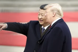 China’s Rising Power Shapes Trump’s Return Visit to Beijing A different China compared to 2017 Donald Trump is visiting Beijing again after his 2017 trip, when he was welcomed with rare state hospitality, including a formal dinner inside the Forbidden City. This time, the setting is even more politically charged as China presents itself as a stronger global power under Xi Jinping. Chinese officials are preparing another high level reception, which may include access to Zhongnanhai, the leadership compound where top decision makers live and work. But the tone of the visit is expected to be shaped less by ceremony and more by serious geopolitical issues. China’s economic and tech transformation Over the past decade, China has expanded its industrial and technological base at a rapid pace. Under Xi Jinping’s leadership, the country has pushed major investment into renewable energy, robotics, and artificial intelligence, often described as “new productive forces.” Northern China is now dominated by large scale solar and wind energy projects, while southern industrial hubs are increasingly driven by automation and smart manufacturing. Cities like Chongqing have transformed from traditional industrial centers into modern tech driven urban economies, supported by strong state investment. Growing rivalry between Washington and Beijing Experts say the balance of power has shifted since 2017. China is no longer trying to simply match the United States, but is widely seen as a near equal competitor on the global stage. Analysts argue that Washington now views Beijing as one of its most serious strategic challengers in modern history. This shift reflects changes in trade strength, technological progress, and global influence. Trade tensions and global flashpoints The agenda for talks between Trump and Xi is expected to cover several sensitive issues. These include trade disputes, advanced technology competition, Taiwan, and rising tensions linked to Iran. These topics reflect deeper disagreements between the two powers, with both sides seeking to protect their economic and security interests in an increasingly complex global environment. Trump’s role in Chinese public perception Public opinion in China toward Trump remains mixed. Some online discussions refer to him as “Chuan Jianguo,” a nickname that suggests his policies may have unintentionally strengthened China’s position by creating friction in US global relations. In parts of China, especially urban centers like Chongqing, some people view his “America First” approach as disruptive to global cooperation. Others see it as part of wider rivalry between the two countries.