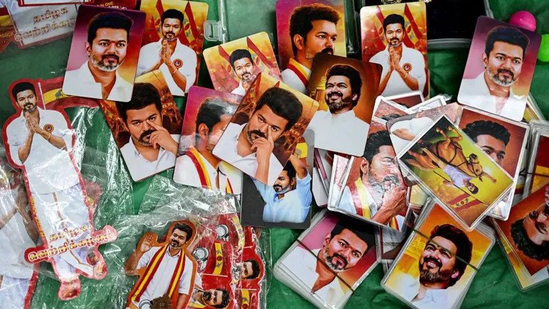 Vijay’s Political Surge Shakes Tamil Nadu’s Traditional Power Structure Indian film star C Joseph Vijay is on the brink of a historic political breakthrough in Tamil Nadu. His party, Tamilaga Vettri Kazhagam, has delivered a strong performance in the state elections, challenging the long-standing dominance of regional giants. A Strong Debut That Disrupts Old Rivals TVK secured 108 seats in the 234-member assembly, falling just 10 seats short of a clear majority. While this does not guarantee immediate power, it places Vijay in a strong position to negotiate alliances with smaller parties and independent candidates. For decades, politics in Tamil Nadu has been controlled by two major players: Dravida Munnetra Kazhagam and All India Anna Dravida Munnetra Kazhagam. Vijay’s rise signals a major shift, breaking the pattern that voters have followed for years. Following a Legacy of Cinema to Politics Vijay’s journey draws comparisons with M. G. Ramachandran, who successfully transitioned from cinema to politics in the late 1970s. Like him, Vijay has used his mass appeal to build a loyal support base. Tamil Nadu has a unique history where film stars have shaped political leadership. Vijay enters this space at a time when many voters feel disconnected from established leaders, creating an opportunity for change. Crafting a New Public Image In recent weeks, Vijay has focused on building his political identity beyond cinema. His visits to temples and churches have gained wide attention across media platforms. This shift stands out in a state where earlier political movements often emphasized rationalism and social equality over religious expression. Analysts believe this approach reflects a calculated strategy to connect with a broader voter base while maintaining his image as a relatable and energetic leader. A Turning Point in State Politics Experts argue that Vijay’s timing has worked in his favor. Voters appear ready for alternatives, and his campaign blends youth appeal with a sense of confidence and leadership. Even if coalition talks decide his immediate future, his performance already marks a key moment in Tamil Nadu politics. It shows that star power, when paired with strategy, can reshape political narratives.