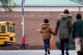 Court Dismisses Charges Against School Official in Virginia Shooting Case Case Background A court in Virginia has dismissed all criminal charges against a former assistant principal from Richneck Elementary School. The case was connected to a classroom shooting in 2023 involving a six year old student. The incident raised serious concerns across the United States about school safety and supervision. What Happened in the Classroom In January 2023, a first grade student brought a firearm into school and fired a single shot during class. The bullet struck teacher Abigail Zwerner in the hand and chest. She required surgery after the attack. The child’s mother, Deja Taylor, later served jail time on a separate drug related firearm charge tied to the weapon used in the shooting. Charges Against the Assistant Principal Former assistant principal Ebony Parker faced eight felony counts of child abuse. Prosecutors argued she failed to act on warnings that the child may have brought a gun to school. Her defense team said the evidence did not meet the legal standard required for conviction and asked the court to dismiss the charges. Judge’s Decision Circuit Court Judge Rebecca Robinson agreed with the defense and dismissed all charges. She stated that the prosecution did not present enough evidence to continue the case. During the ruling, Parker showed an emotional reaction as the decision was announced. The judge also acknowledged the seriousness of the incident, describing it as deeply troubling while explaining the legal reasoning behind the dismissal. Impact of the Case The shooting and the court outcome have sparked ongoing debate about responsibility within schools, child safety policies, and how warning signs are handled by staff and administrators.