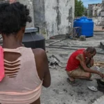 fe The crisis has been driven by a severe lack of diesel and fuel oil, which are essential for electricity generation. Reports indicate the country’s power system is under extreme pressure, with hospitals struggling to operate normally and many schools and government offices shutting down. Tourism, one of Cuba’s key income sources, has also been heavily disrupted. Recent reporting shows parts of Havana and other regions have experienced extremely long power cuts, in some cases lasting most of the day, as the national grid weakens further. Tensions over fuel supply and sanctions Cuban officials argue that US restrictions on fuel imports are the main reason for the shortage. They say these measures have reduced or stopped shipments from traditional suppliers such as Venezuela and Mexico. US officials, however, have defended their policy, saying the economic pressure is linked to broader political conditions and governance issues in Havana. Washington has also renewed its aid offer while maintaining criticism of Cuba’s leadership. Rare protests highlight public frustration The worsening situation has triggered rare street protests in Havana and other cities. Residents have demonstrated against prolonged blackouts, with growing anger over food spoilage, lack of electricity, and disruptions to essential services. Key point Cuba is now balancing between accepting external assistance and managing a deepening energy emergency that is already affecting healthcare, education, and public order.