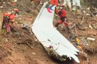 Deadly China Plane Crash Linked to Mid-Air Fuel Cut-Off, New Report Reveals Key Findings from Investigation A new investigation has revealed a shocking cause behind the 2022 China plane crash that killed all 132 people on board. According to data released by the US National Transportation Safety Board (NTSB), the aircraft’s fuel supply was cut off during flight. The aircraft, a Boeing 737 operated by China Eastern Airlines, was cruising at around 29,000 feet when both engine fuel switches were moved to the “cut-off” position. This action stopped fuel from reaching the engines, causing a rapid loss of power. Sudden and Rapid Descent Flight tracking data shows the plane dropped thousands of meters within minutes. It went from about 29,100 feet to just over 9,000 feet in a little more than two minutes. The final signal placed the aircraft at a much lower altitude before it crashed into a hillside. Air traffic controllers tried to contact the pilots during the descent, but there was no response. Black Box Data Supports Theory Investigators recovered the aircraft’s black box from the crash site. The data confirmed that engine performance dropped sharply right after the fuel switches were turned off. Fuel switches are critical controls used by pilots to start or shut down engines. Their movement during normal flight is highly unusual, which has raised serious concerns about possible intentional action. Flight Details and Timeline The flight, MU5735, took off from Kunming and was heading to Guangzhou. It had been in the air for over an hour and was close to landing when the incident occurred. This crash remains the deadliest aviation disaster in China in decades. Ongoing Investigation and Unanswered Questions China’s Civil Aviation Administration (CAA) is leading the investigation. Authorities have not yet released a final report, citing national security concerns. Officials earlier stated that the flight crew were qualified, well-rested, and medically fit on the day of the flight. However, the exact reason behind the fuel switch movement remains unclear. Investigators continue to examine whether the crash resulted from deliberate action, human error, or a technical issue.