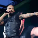 Drake Targets Kendrick Lamar and Others in Surprise Triple Album Release Drake revisits Kendrick Lamar feud in new music Drake has sparked fresh attention after using his new triple album drop to touch on his long running conflict with Kendrick Lamar. Listeners quickly pointed out lyrics that appear to reference the rivalry that escalated in 2024. In one track, Drake questions public charity moments in Compton, Los Angeles, suggesting that some artists use their hometown image for publicity before returning to a more private celebrity lifestyle. The line being discussed is: “Handin’ out turkeys on camera inside of your hood, then you go back to the hills.” Personal reflections in “Make Them Cry” On the opening track of Iceman, titled Make Them Cry, Drake appears more emotional and reflective. He references the pressure around the feud and his own mental state. He raps, “Tell us how it felt to meet the grim reaper. This album better have some big features. Well, sorry to burst your bubble, but I’m all alone for my mental health.” The track also includes a personal revelation, where he mentions that his father has been diagnosed with cancer, adding a more vulnerable tone to the project. Calls out other celebrities and athletes Beyond Kendrick Lamar, Drake also appears to address other public figures who were seen as supporting his rival during the beef. One line is widely interpreted as a reference to NBA star LeBron James, who attended a Kendrick concert during the height of the tension. He also seems to mention DJ Khaled, following criticism in public discourse about his silence on global issues, including the war in Gaza. Mixed reaction and streaming impact Critics have not fully reviewed the albums yet, but early audience response has been strong. Streaming platforms reportedly faced slowdowns and temporary crashes as fans rushed to play the 43 track release across Iceman, Habibti, and Maid of Honour. Album style breakdown The three projects each explore different sounds. Iceman focuses on rap and hip hop. Habibti leans into R&B influences. Maid of Honour brings a more dance inspired direction.