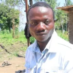Ebola Outbreak in DR Congo May Be Spreading Faster Than Expected Fear Grows as Ebola Cases Rise in DR Congo Health officials are raising concerns that the latest Ebola outbreak in the Democratic Republic of Congo could be spreading more rapidly than first believed. People living in Ituri province, where the outbreak began, say fear is growing as more families witness the deadly effects of the virus. Residents described the situation as frightening and painful. Many said infected people are dying within a short time after showing symptoms. Communities are trying to protect themselves by washing hands regularly and avoiding close contact with sick individuals. However, many families still lack important protective supplies, including face masks and medical support. According to health officials, Ebola has already claimed 131 lives in DR Congo. Authorities have also reported more than 513 suspected cases across the country. In neighboring Uganda, one death linked to the virus has also been confirmed. WHO Warns About Wider Spread Medical experts believe the real number of infections may be much higher than current reports suggest. Health teams investigating the outbreak discovered signs that the virus may have already spread into additional areas before authorities officially detected it in April. Researchers from a global infectious disease analysis center in London estimated that many cases may have gone undetected. Their findings suggest the outbreak could already involve more than 1,000 infections. Experts say the exact scale remains uncertain because many communities still struggle to access healthcare and testing facilities. The World Health Organization recently declared the outbreak an international health emergency. WHO Director General Tedros Adhanom Ghebreyesus expressed serious concern about the speed of the epidemic and urged stronger international support. Communities Struggle to Stay Safe People living near the outbreak zone say they need more information and medical resources. Some residents admitted they do not know what steps to take if a relative becomes infected. Aid organizations warn that Ebola can spread quickly when communities lack awareness and hospitals become overwhelmed. Emergency teams continue working to identify cases, isolate infected patients, and educate local communities about prevention methods. Officials are also encouraging people to remain calm while following health safety measures. No Approved Vaccine for Current Ebola Strain Doctors confirmed that no approved vaccine currently exists for the strain responsible for the outbreak. Even so, health experts are studying whether other treatments or experimental drugs may help reduce infections and protect vulnerable communities. Medical teams fear the virus may have circulated for several weeks before the first official detection. That delay may have allowed Ebola to spread more widely across affected regions.