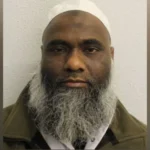 A former imam in east London has been sentenced to life in prison. He must serve at least 20 years. The court found him guilty of serious sexual crimes against women and girls. Abdul Halim Khan, aged 54, used his religious position to gain trust. He then abused that trust to target victims from his local community. Abuse of Religious Authority The court heard that Khan used his role as an imam to control and manipulate victims. He targeted women and girls from the Bangladeshi Muslim community between 2005 and 2014. He chose isolated places to carry out the attacks. These included private flats and hidden locations. The victims said they felt trapped and afraid to speak out due to his influence. Conviction and Charges In February, a jury found Khan guilty of multiple offences. These included rape, sexual assault, and child sexual offences. In total, he was convicted on 21 counts. The judge stated that Khan abused his position of trust. The court also highlighted how he used religious influence to silence victims. Judge’s Remarks on the Case At Snaresbrook Crown Court, the judge described Khan as manipulative and dangerous. The court said he misused religion for personal gain. The judge said Khan believed his position made him untouchable. He also believed victims would not be believed if they reported the abuse. Impact on Victims Victims gave powerful statements in court. They described long lasting emotional trauma and fear. One victim said she was abused as a child. She said the experience deeply affected her mental health. Another victim described Khan as someone who caused extreme harm and fear through lies and manipulation. Some victims said the abuse pushed them toward self harm and severe emotional distress.