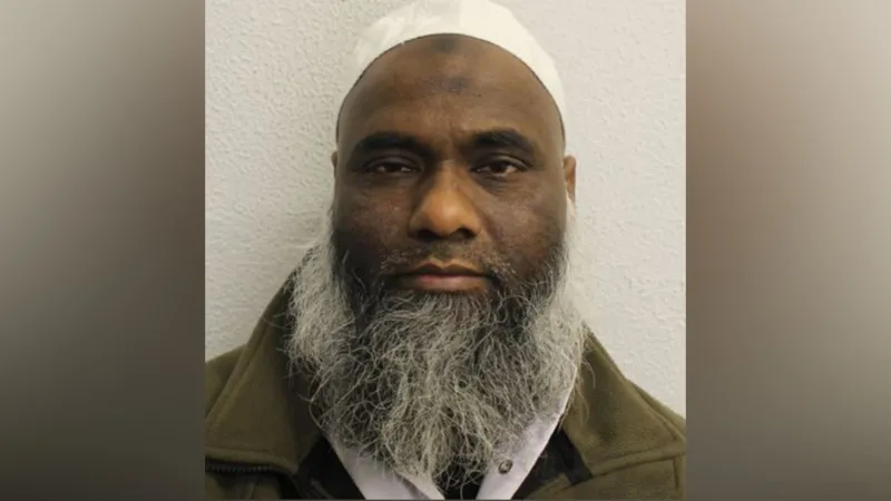 A former imam in east London has been sentenced to life in prison. He must serve at least 20 years. The court found him guilty of serious sexual crimes against women and girls. Abdul Halim Khan, aged 54, used his religious position to gain trust. He then abused that trust to target victims from his local community. Abuse of Religious Authority The court heard that Khan used his role as an imam to control and manipulate victims. He targeted women and girls from the Bangladeshi Muslim community between 2005 and 2014. He chose isolated places to carry out the attacks. These included private flats and hidden locations. The victims said they felt trapped and afraid to speak out due to his influence. Conviction and Charges In February, a jury found Khan guilty of multiple offences. These included rape, sexual assault, and child sexual offences. In total, he was convicted on 21 counts. The judge stated that Khan abused his position of trust. The court also highlighted how he used religious influence to silence victims. Judge’s Remarks on the Case At Snaresbrook Crown Court, the judge described Khan as manipulative and dangerous. The court said he misused religion for personal gain. The judge said Khan believed his position made him untouchable. He also believed victims would not be believed if they reported the abuse. Impact on Victims Victims gave powerful statements in court. They described long lasting emotional trauma and fear. One victim said she was abused as a child. She said the experience deeply affected her mental health. Another victim described Khan as someone who caused extreme harm and fear through lies and manipulation. Some victims said the abuse pushed them toward self harm and severe emotional distress.