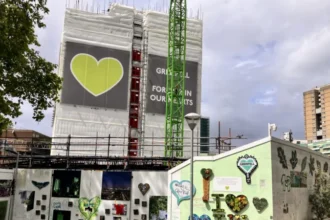 Grenfell Fire Investigation Moves Closer to Criminal Charges Families Still Waiting for Justice After Grenfell Tragedy Nearly a decade after the devastating Grenfell Tower fire, police say up to 57 individuals and 20 companies could face criminal charges linked to the disaster that killed 72 people in West London in June 2017. The Metropolitan Police confirmed that investigators are reviewing several serious offences. These include corporate gross negligence manslaughter, fraud, health and safety violations, and misconduct in public office. Officials stated that evidence files will be handed to the Crown Prosecution Service by the end of September 2026. However, prosecutors may not decide whether charges will move forward until June 2027, marking 10 years since the deadly fire. If legal action begins, court trials are not expected before 2029. One of the Largest Investigations in UK History The criminal investigation, known as Operation Northleigh, has become one of the most extensive inquiries ever carried out by the Metropolitan Police. Investigators examined the actions of around 15,000 people connected to nearly 700 organisations. Authorities reportedly spent around £150 million on the investigation. The Grenfell Tower fire inquiry previously concluded that a series of failures led to the disaster. The report pointed to government mistakes, dishonest companies, and major shortcomings within the fire service. Families Demand Faster Accountability Relatives of the victims say they are still waiting for justice after years of delays. Jackie Leger and Bernie Bernard, whose brother Raymond “Moses” Bernard died in the fire, said they hope those responsible will finally face charges for their role in the tragedy. Survivor and family support group Grenfell United described the latest update as an important step forward. However, the organisation stressed that the community remains cautious and heartbroken after waiting so long for accountability. The group also urged the government and Ministry of Justice to ensure courts have enough resources to handle any future prosecutions quickly. Growing Frustration Over Delays Another support organisation, Grenfell Next of Kin, said the update brings little comfort to grieving families. Members criticised the long delays in the justice process and said public confidence in official institutions has collapsed. The organisation argued that the criminal investigation should have received priority from the beginning. Members believe the lengthy public inquiry slowed down the path toward criminal accountability. Despite the frustration, many families continue to push for justice and answers as the case moves closer to possible prosecutions.