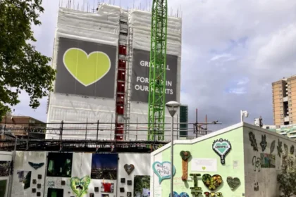Grenfell Fire Investigation Moves Closer to Criminal Charges Families Still Waiting for Justice After Grenfell Tragedy Nearly a decade after the devastating Grenfell Tower fire, police say up to 57 individuals and 20 companies could face criminal charges linked to the disaster that killed 72 people in West London in June 2017. The Metropolitan Police confirmed that investigators are reviewing several serious offences. These include corporate gross negligence manslaughter, fraud, health and safety violations, and misconduct in public office. Officials stated that evidence files will be handed to the Crown Prosecution Service by the end of September 2026. However, prosecutors may not decide whether charges will move forward until June 2027, marking 10 years since the deadly fire. If legal action begins, court trials are not expected before 2029. One of the Largest Investigations in UK History The criminal investigation, known as Operation Northleigh, has become one of the most extensive inquiries ever carried out by the Metropolitan Police. Investigators examined the actions of around 15,000 people connected to nearly 700 organisations. Authorities reportedly spent around £150 million on the investigation. The Grenfell Tower fire inquiry previously concluded that a series of failures led to the disaster. The report pointed to government mistakes, dishonest companies, and major shortcomings within the fire service. Families Demand Faster Accountability Relatives of the victims say they are still waiting for justice after years of delays. Jackie Leger and Bernie Bernard, whose brother Raymond “Moses” Bernard died in the fire, said they hope those responsible will finally face charges for their role in the tragedy. Survivor and family support group Grenfell United described the latest update as an important step forward. However, the organisation stressed that the community remains cautious and heartbroken after waiting so long for accountability. The group also urged the government and Ministry of Justice to ensure courts have enough resources to handle any future prosecutions quickly. Growing Frustration Over Delays Another support organisation, Grenfell Next of Kin, said the update brings little comfort to grieving families. Members criticised the long delays in the justice process and said public confidence in official institutions has collapsed. The organisation argued that the criminal investigation should have received priority from the beginning. Members believe the lengthy public inquiry slowed down the path toward criminal accountability. Despite the frustration, many families continue to push for justice and answers as the case moves closer to possible prosecutions.