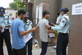 NEET UG Exam Paper Leak Controversy Leaves Students Distressed in India Exam Cancellation Sparks Nationwide Shock India’s medical entrance journey has been shaken after allegations of a question paper leak in the NEET UG exam held on 3 May. The National Testing Agency cancelled the test while an investigation continues. A retest date is expected soon. Students who spent months preparing now face fresh uncertainty. Manas Sharma, one of the candidates, said he had dedicated nearly two years to this exam. He followed a strict study routine and often studied up to 12 hours daily. After the cancellation, he said the news left him completely shocked. He added that he expected a strong score based on unofficial answer keys shared after the exam. That score could have helped him secure admission to a top medical college. Intense Competition for Medical Seats NEET UG plays a key role in medical admissions across India. Every year, millions of students compete for a limited number of seats in government and private medical colleges. Because of this pressure, many students depend on coaching centres. These centres run long classes that often extend study hours far beyond school schedules. Students spend years preparing for a single attempt. Emotional Stress on Aspirants The cancellation has increased stress for many candidates. Several students said they had to completely restart their preparation plans. Sumi, a 20 year old aspirant from Assam, said she could not believe the exam was cancelled at first. She has now returned to her study routine but admitted that her focus has dropped due to stress. Anamika, a 22 year old student from Bihar, said this was her sixth attempt. She explained that repeated preparation cycles are emotionally exhausting, especially when unexpected changes occur. Growing Concerns Over Exam Integrity The controversy has raised serious questions about exam security and fairness. Students now worry about how such issues can affect future attempts and admission chances. Many aspirants feel their months of preparation have been wasted. Others are trying to adjust quickly and wait for the new exam schedule.
