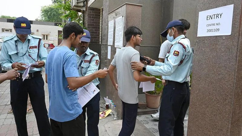 NEET UG Exam Paper Leak Controversy Leaves Students Distressed in India Exam Cancellation Sparks Nationwide Shock India’s medical entrance journey has been shaken after allegations of a question paper leak in the NEET UG exam held on 3 May. The National Testing Agency cancelled the test while an investigation continues. A retest date is expected soon. Students who spent months preparing now face fresh uncertainty. Manas Sharma, one of the candidates, said he had dedicated nearly two years to this exam. He followed a strict study routine and often studied up to 12 hours daily. After the cancellation, he said the news left him completely shocked. He added that he expected a strong score based on unofficial answer keys shared after the exam. That score could have helped him secure admission to a top medical college. Intense Competition for Medical Seats NEET UG plays a key role in medical admissions across India. Every year, millions of students compete for a limited number of seats in government and private medical colleges. Because of this pressure, many students depend on coaching centres. These centres run long classes that often extend study hours far beyond school schedules. Students spend years preparing for a single attempt. Emotional Stress on Aspirants The cancellation has increased stress for many candidates. Several students said they had to completely restart their preparation plans. Sumi, a 20 year old aspirant from Assam, said she could not believe the exam was cancelled at first. She has now returned to her study routine but admitted that her focus has dropped due to stress. Anamika, a 22 year old student from Bihar, said this was her sixth attempt. She explained that repeated preparation cycles are emotionally exhausting, especially when unexpected changes occur. Growing Concerns Over Exam Integrity The controversy has raised serious questions about exam security and fairness. Students now worry about how such issues can affect future attempts and admission chances. Many aspirants feel their months of preparation have been wasted. Others are trying to adjust quickly and wait for the new exam schedule.