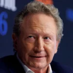 The Yindjibarndi people in north western Australia have secured a record A$150.1 million payout after a Federal Court ruling confirmed that mining took place on their traditional land without their proper consent. The decision ends a long legal dispute with billionaire Andrew Forrest, founder of Fortescue, one of Australia’s largest mining companies. Background of the Mining Dispute Fortescue developed major iron ore mining operations in the Pilbara region. These operations began producing revenue worth tens of billions of dollars after 2013. The company operated on Yindjibarndi land with approval from government authorities and a local Aboriginal group. However, the Yindjibarndi Ngurra Aboriginal Corporation did not give consent for the mining activities. This disagreement led to a prolonged legal battle that started formally in 2017, although mining had already been underway for several years. Court Findings and Compensation Decision Federal Court Justice Stephen Burley ruled that Fortescue must pay compensation for both economic and cultural loss. The court assessed economic loss at A$150,000. It also set cultural loss compensation at A$150 million. The judgment recognised the strong spiritual and cultural connection the Yindjibarndi people maintain with their land. The court also noted the loss of access to around 250 cultural sites. The judge described cultural loss as the loss of traditional attachment to country and the loss of spiritual connection to the land. Native Title Rights and Legal Background In 2017, the court confirmed exclusive native title rights for the Yindjibarndi people over a 2,700 square kilometre area in the Pilbara region. Despite this recognition, mining activities had already expanded across the land. The absence of an agreement between the Yindjibarndi group and Fortescue became the central issue in the case. Community Reaction to the Verdict Some Yindjibarndi elders welcomed the ruling, but others expressed disappointment with the final amount. Elder Wendy Hubert said the compensation felt small compared to the enormous profits generated from the land over many years. The mining operations are expected to continue for more than a decade, with closure projected in the mid 2040s.
