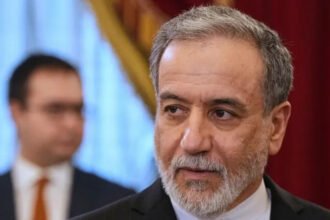 Rising tensions in the Gulf continue to threaten global energy supplies and diplomatic efforts Iran has sharply criticized the United States after fresh military activity near the Strait of Hormuz. Iranian Foreign Minister Abbas Araghchi said Washington keeps choosing military action even when diplomatic discussions remain possible. In a statement shared on X, Araghchi said Iran would never surrender to pressure or threats. He questioned whether the latest American actions were part of a deliberate strategy or the result of misleading political influence on US President Donald Trump. The exchange of accusations came after both countries blamed each other for recent attacks in the Strait of Hormuz. At the same time, US forces reportedly targeted more Iranian vessels in nearby waters. Despite the growing tensions, Trump stated that the ceasefire agreement still remains active. The ceasefire aims to create space for negotiations that could end the conflict involving the US, Israel, and Iran. US Secretary of State Marco Rubio said Iran is expected to respond soon to new American proposals. Speaking during a visit to Italy, Rubio expressed hope that Tehran would seriously consider the offer. Iran has continued to tighten control over the Strait of Hormuz while also targeting US allies in the Gulf region. The strategic waterway handles nearly 20% of the world’s oil and liquefied natural gas shipments. Concerns over disruptions in the area have already pushed global energy prices higher. Earlier this week, Trump approved and later paused a military operation aimed at helping thousands of stranded vessels move through the region. Many ships have remained stuck since February due to ongoing security threats. The United States has also maintained a naval blockade around Iranian ports to pressure Tehran into accepting American conditions. Iranian officials strongly criticized the move and called it unlawful. On Friday, US Central Command announced that American forces stopped two Iranian oil tankers from entering an Iranian port in the Gulf of Oman. According to the statement, US forces used precision strikes to disable the vessels after they allegedly violated the blockade. American officials also claimed that more than 70 tankers are currently being prevented from entering or leaving Iranian ports. The latest incidents followed Thursday’s confrontation in the Strait of Hormuz. US officials accused Iran of launching drones, missiles, and small boat attacks against American warships. Iran’s military leadership rejected the accusation and instead claimed that US forces targeted Iranian ships and carried out airstrikes on coastal areas. Reports from Iranian authorities said one cargo vessel near Minab caught fire during the attacks. The situation has further increased fears of a wider regional conflict and deeper instability in global energy markets.