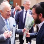 King Charles III visits Golders Green to meet victims of recent attacks, offering support to the Jewish community and raising concern about rising antisemitism.