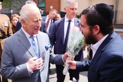 King Charles III visits Golders Green to meet victims of recent attacks, offering support to the Jewish community and raising concern about rising antisemitism.