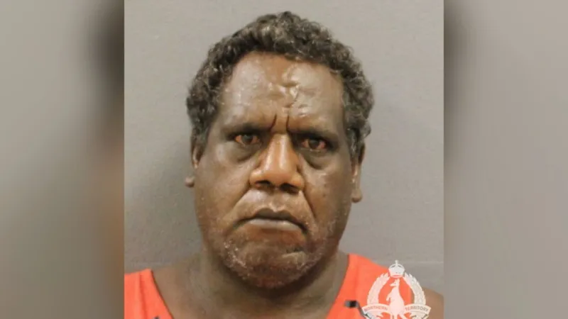 Man Charged with Murder of 5-Year-Old Girl in Australia Tragic Discovery After Days of Search Police in Australia have charged a 47-year-old man with the murder of a five-year-old girl after officers found her body following an extensive search operation. The child, referred to as Kumanjayi Little Baby, is being identified with a culturally respectful name chosen by her family after her death. Authorities discovered her body on Thursday after several days of searching. Suspect to Appear in Court Police charged Jefferson Lewis on Saturday night. He is scheduled to appear in a Darwin court on Tuesday. Officials confirmed that the investigation remains ongoing. They urged the public to stay calm and allow the legal process to continue without interference. Community Unrest in Alice Springs The case has deeply affected the local community. Protests and unrest broke out in Alice Springs following the child’s death. Police arrested five people in connection with violent riots linked to the incident. Authorities continue to monitor the situation to prevent further escalation. Officials Urge Respect and Calm Northern Territory Police Commissioner Martin Dole expressed his condolences to the family. He described the case as heartbreaking and asked the public to respect the judicial process. Community leaders have also spoken out. The girl’s grandfather, a respected Warlpiri elder, urged people to remain peaceful. He said the violence does not reflect their cultural values. Family Shares Emotional Tribute In a statement, the girl’s mother shared her grief and love for her daughter. She said life will be very difficult without her. She also expressed hope of being reunited with her daughter one day. The message highlighted the deep emotional impact of the tragedy on the family.