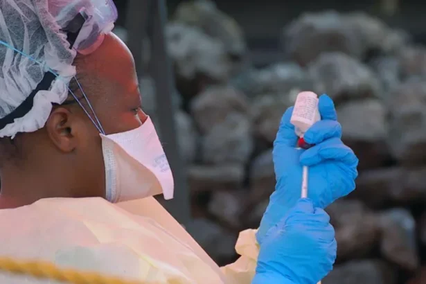 Ebola Outbreak in DR Congo Raises Concern Over Regional Spread Health authorities in the Democratic Republic of the Congo are closely monitoring a growing Ebola outbreak in the eastern part of the country. Early laboratory tests confirmed the virus in several samples collected from suspected patients. The Institut National de Recherche Biomédicale (INRB) in Kinshasa tested 20 samples and detected Ebola in 13 of them. Medical experts are now working to identify the exact strain of the virus. Officials reported 65 deaths linked to the outbreak. However, only four deaths have been confirmed through laboratory testing so far. Health teams continue to investigate other suspected cases in affected areas. Ebola Cases Confirmed in Eastern DR Congo The outbreak has mainly affected parts of Ituri province, including the provincial capital Bunia. Authorities also identified suspected infections in nearby communities. Laboratory teams are still checking samples from those areas. Health workers have increased monitoring efforts to prevent further transmission. Emergency teams are also tracing people who may have come into contact with infected patients. Health Officials Monitor Virus Strain Scientists are conducting more tests to determine the Ebola strain behind the outbreak. Identifying the strain will help medical teams improve response strategies and treatment planning. Health experts continue to study how quickly the virus spreads in the affected regions. Officials believe early detection remains critical for controlling the outbreak. Mining Towns Face Higher Risk Africa CDC warned that mining towns such as Mongwalu face a higher risk of transmission because of crowded conditions and frequent movement of workers. Urban areas like Bunia and Rwampara also remain vulnerable. Large populations and busy transport routes may increase the chances of the virus spreading further. Medical officials urged residents to follow safety guidelines issued by national health authorities. Communities have also received instructions on hygiene practices and reporting symptoms quickly. Regional Coordination Becomes Urgent Africa CDC Executive Director Jean Kaseya said cross border coordination is necessary because many people regularly travel between affected areas and neighboring countries. Health authorities from nearby nations are now discussing emergency response plans and surveillance measures. Officials want to strengthen border monitoring and improve communication between regional health agencies. The Congolese government has not officially declared a national outbreak yet. Authorities are expected to provide more updates as investigations continue and additional test results become available.