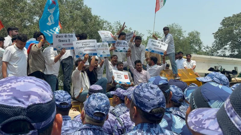 NEET UG Exam Cancellation Sparks Protests in India Massive exam controversy shakes medical aspirants India’s medical entrance exam, NEET UG, has been cancelled after allegations of a question paper leak surfaced soon after the test. The exam, held on 3 May, was the key entry route for medical college admissions across the country. Around 2.28 million students appeared for the test at more than 5000 centres. The sudden cancellation has triggered strong reactions from students and parents who spent months preparing for it. Allegations of paper leak and investigation Authorities began investigating reports that exam material may have been leaked before the test. Police officials in Rajasthan reported concerns over a so called guess paper that reportedly circulated before the exam. According to officials, the guess paper contained around 410 questions. Nearly 120 of those questions are believed to match the chemistry section of the actual exam. The exam had multiple sets, each containing 180 compulsory questions from physics, chemistry, and biology. The case has now been transferred to the Central Bureau of Investigation for deeper inquiry. National Testing Agency decision The National Testing Agency stated that it cancelled the exam after reviewing evidence from the ongoing investigation. It said the decision was taken to protect the credibility of the national testing system and maintain student trust. However, the agency has not announced new exam dates yet. This has increased stress among students who are now uncertain about the admission timeline. Student and political reaction Student groups and political youth organisations began protests in Delhi following the announcement. They demanded transparency, accountability, and a clear timeline for a new exam. Many students expressed frustration after years of preparation. A student from Delhi shared that her last two years were fully focused on preparing for this exam, and the sudden cancellation has left her uncertain about her future. Growing concern among aspirants The delay has raised fears of a disrupted admission cycle for medical colleges across India. Parents and students are urging authorities to act quickly and restore confidence in the exam system.