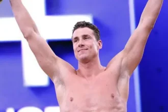 Record Swim at Controversial Event Kristian Gkolomeev from Greece delivered the fastest time ever recorded in the 50m freestyle, clocking 20.81 seconds in Las Vegas. His swim beat the official world best of 20.88 seconds set by Cameron McEvoy. Despite the result, sporting authorities will not recognise the time. The event does not follow international anti doping rules and allows performance enhancing drugs. Why the Result Is Not Official Global bodies such as the International Olympic Committee and the World Anti Doping Agency reject the competition. Athletes at the event are allowed to use substances banned in official sport. World Aquatics also criticised the competition, calling it a spectacle built on shortcuts. Officials argue that results from this setting cannot count as official records. Conditions and Rewards at the Event Gkolomeev competed using a polyurethane suit, which is not allowed in sanctioned races. Organisers rewarded him with 250 thousand dollars for winning and added a 1 million dollar bonus for the unofficial record. He said the result changed his life and would support his family. He also indicated he plans to return next year to attempt another record. Other Performances at the Enhanced Games Fred Kerley from the United States won the 100m sprint in 9.97 seconds. He did not match his personal best of 9.76 seconds. British swimmer Ben Proud won the 50m butterfly in 22.32 seconds. His time was close to the world record but did not surpass it. He expressed frustration at missing a record. Emily Barclay from Britain won the women 50m freestyle in 24.09 seconds. This was slower than the official world record. Strongman athlete Hafthor Bjornsson also competed but did not break his 510 kilogram deadlift record. Debate Around Drug Use in Sport The Enhanced Games allows substances approved for medical use in the United States, including testosterone and growth hormones. These are banned in traditional sport. Organisers say controlled enhancement is safer and more transparent than hidden doping. Critics argue it threatens fair competition and undermines sport integrity. Public Reaction and Attendance The event took place in front of about 2500 invited spectators. Tickets were not sold to the general public. Many sports authorities publicly criticised athletes who took part. Some organisations may impose bans on competitors in future events.