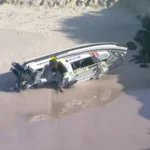 Three people including two volunteer rescuers died after a yacht sank near Ballina on the NSW coast during a rescue operation in dangerous sea conditions.