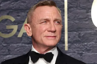 Search for Next James Bond Begins as Casting Gets Underway Official Casting Process Starts The search for the next James Bond has officially begun. Amazon MGM Studios has confirmed that auditions for the role of 007 are now in progress. This confirms long standing speculation about when the franchise would move forward after Daniel Craig’s exit. The studio says it will share more updates when the timing is right. For now, details about the casting process remain private. Long Wait After Daniel Craig Era Fans have been waiting since the release of No Time To Die. That film marked the end of Daniel Craig’s run as James Bond. Since then, there has been no official replacement. This gap has fueled constant debate about who will take over the iconic spy role. Early Rumours Around Casting Industry reports suggest that early auditions have already taken place in recent weeks. No official shortlist has been released yet. Actor Callum Turner has been widely discussed as a possible candidate. However, the studio has not confirmed any names. Creative Team Already in Place The next Bond film already has a strong team behind it. Director Denis Villeneuve is set to lead the project. Writer Steven Knight is also working on the script. Both bring major experience in film and television storytelling. What Happens Next Casting will continue over the coming months. The studio is expected to reveal more updates once decisions are finalized. No release date has been announced yet.