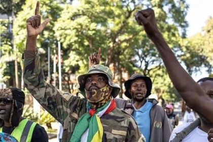 South Africa Denies Viral Videos Showing Xenophobic Attacks South Africa has strongly rejected viral videos and images that allegedly show attacks on foreign nationals. Government officials say the clips are fake and designed to damage the country’s international image. The issue has increased diplomatic tension between South Africa and several African nations. Governments across the continent have expressed concern over reports of growing anti immigrant sentiment and possible threats against foreign citizens living in the country. African Countries Raise Concerns Ghana officially contacted the African Union and asked for discussions on the situation. Ghana described the reports as a serious threat to the safety and wellbeing of Africans living in South Africa. The country also requested a fact finding mission to investigate the claims. Nigeria also raised concerns and offered to help repatriate its citizens who may feel unsafe. Meanwhile, Kenya, Malawi, Lesotho, and Zimbabwe advised their nationals in South Africa to stay alert. South African authorities responded by saying the country has nothing to hide and remains committed to African unity. Government Calls Videos Misleading Minister in the Presidency Khumbudzo Ntshavheni said the circulating footage and images were fake and misleading. According to the government, the content aims to damage South Africa’s reputation and weaken its efforts to promote stronger relations across Africa. The controversy began after several videos spread online over the past two weeks. Some clips appeared to show groups confronting people suspected of being undocumented immigrants. In one widely shared video, a man believed to be from Ghana was reportedly told to return and “fix his country.” Despite the viral content, officials insist many of the claims surrounding the footage are inaccurate or exaggerated. Immigration Protests Continue Thousands of South Africans have recently joined protests in major cities demanding stricter action against illegal immigration. Demonstrators argue that undocumented migration affects jobs, housing availability, and crime levels. The government acknowledged that citizens have the legal right to protest. However, officials warned against violence and unlawful actions during demonstrations. Unlike previous periods of xenophobic unrest in South Africa, authorities say the latest protests have mostly remained peaceful. There have been no confirmed reports of widespread looting or attacks targeting foreign owned businesses. Ramaphosa Says South Africa Welcomes Foreign Nationals Presidential spokespersons for Cyril Ramaphosa stated that South Africa remains a welcoming nation. The presidency also rejected claims that South Africans are generally xenophobic. Xenophobia has remained a sensitive issue in South Africa for years. Past outbreaks of violence against migrants have caused concern across Africa. The latest controversy has once again placed the issue under international attention.