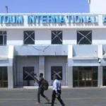 Sudan Accuses Ethiopia and UAE Over Drone Attacks on Khartoum Airport What Happened in Khartoum Sudan has accused Ethiopia and the United Arab Emirates of involvement in drone attacks on Khartoum International Airport. The strikes also targeted several military sites in the Greater Khartoum region. Authorities say the attacks disrupted airport operations and forced a temporary shutdown. Officials confirmed that no casualties were reported. However, the incident has raised serious security concerns in the capital. Government Response and Allegations Sudan described the strikes as direct aggression against its sovereignty. The army claims it has evidence showing drones were launched from Bahir Dar airport in Ethiopia. Military officials also stated that one drone linked to the UAE entered Sudanese airspace and was later shot down. Sudanese authorities have previously accused the Rapid Support Forces of operating with support from outside the country. The government has recalled its ambassador from Ethiopia for consultations after the incident. Reactions From Ethiopia and UAE Ethiopia rejected the accusations and called them baseless. The United Arab Emirates has not issued a new statement on the latest claims. In earlier comments, the UAE denied any military involvement in Sudan’s internal conflict. Background to the Conflict Sudan has been facing an ongoing conflict between the national army and the Rapid Support Forces since 2023. Khartoum airport has repeatedly been a key strategic site in the fighting. The airport had recently seen a return of limited international flights after years of disruption. The latest drone attacks came shortly after this brief return to normal operations. Reports have also suggested regional tensions involving neighboring countries, though these claims remain disputed. Impact on Airport Operations Following the attacks, Sudanese authorities suspended airport operations for 72 hours. This decision was made to ensure safety and assess damage. The suspension has disrupted travel and highlighted the fragile security situation in the capital.