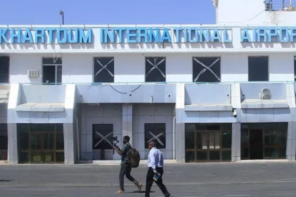 Sudan Accuses Ethiopia and UAE Over Drone Attacks on Khartoum Airport What Happened in Khartoum Sudan has accused Ethiopia and the United Arab Emirates of involvement in drone attacks on Khartoum International Airport. The strikes also targeted several military sites in the Greater Khartoum region. Authorities say the attacks disrupted airport operations and forced a temporary shutdown. Officials confirmed that no casualties were reported. However, the incident has raised serious security concerns in the capital. Government Response and Allegations Sudan described the strikes as direct aggression against its sovereignty. The army claims it has evidence showing drones were launched from Bahir Dar airport in Ethiopia. Military officials also stated that one drone linked to the UAE entered Sudanese airspace and was later shot down. Sudanese authorities have previously accused the Rapid Support Forces of operating with support from outside the country. The government has recalled its ambassador from Ethiopia for consultations after the incident. Reactions From Ethiopia and UAE Ethiopia rejected the accusations and called them baseless. The United Arab Emirates has not issued a new statement on the latest claims. In earlier comments, the UAE denied any military involvement in Sudan’s internal conflict. Background to the Conflict Sudan has been facing an ongoing conflict between the national army and the Rapid Support Forces since 2023. Khartoum airport has repeatedly been a key strategic site in the fighting. The airport had recently seen a return of limited international flights after years of disruption. The latest drone attacks came shortly after this brief return to normal operations. Reports have also suggested regional tensions involving neighboring countries, though these claims remain disputed. Impact on Airport Operations Following the attacks, Sudanese authorities suspended airport operations for 72 hours. This decision was made to ensure safety and assess damage. The suspension has disrupted travel and highlighted the fragile security situation in the capital.