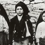 The Fátima Prophecies and the “Miracle of the Sun” That Shaped Cold War Beliefs Three Children Claimed They Saw a Divine Vision in Portugal In May 1917, three young shepherd children from Fátima, Portugal, claimed they witnessed an apparition of the Virgin Mary while tending sheep in a field. The children, Lucia dos Santos and her cousins Francisco and Jacinta Marta, said the glowing figure appeared near an oak tree and instructed them to return on the 13th day of each month for the next five months. Their story quickly spread across Portugal and attracted thousands of believers. Over time, the reported visions became one of the most discussed religious events of the 20th century. Many people believed the messages contained warnings about war, faith, and the future of Russia under communism. The “Miracle of the Sun” Drew Thousands of Witnesses On 13 October 1917, a massive crowd gathered in Fátima to witness the final predicted appearance. Many people later claimed they saw extraordinary events in the sky. Witnesses described the Sun changing colors, spinning rapidly, and moving like a wheel of fire. Some also reported seeing flower-like shapes falling from the sky. Others believed people with illnesses were suddenly healed during the event. One witness recalled that the Sun appeared to spin faster and faster before returning to its normal position. While many people considered it a miracle, others suggested it may have been a natural atmospheric event or a case of mass psychological influence. Despite the debate, the event left a strong emotional impact on those who attended. Fear, faith, and wonder spread through the crowd as people tried to understand what they had seen. The Three Secrets of Fátima The children claimed they received three important revelations during the apparitions. These became known as the “Three Secrets of Fátima.” The first secret reportedly included a vision of Hell and warnings about future suffering and war. Many believers later connected it to the outbreak of World War II. The second prophecy focused on Russia. According to the message, devotion and prayer could eventually save Russia from communism. Because the message emerged shortly before the Russian Revolution, it later gained major attention during the Cold War. The third secret remained hidden inside the Vatican archives for decades. Its secrecy created worldwide speculation and increased global interest in Fátima. Many people believed it predicted major political and religious events of the 20th century. How Fátima Became Linked to Anti Communist Beliefs As communism spread across Eastern Europe and the Soviet Union grew stronger, the Fátima prophecies became closely tied to anti communist movements. Religious groups viewed the messages as spiritual warnings against atheism and Soviet ideology. Although the Catholic Church initially reacted cautiously to the reports, it officially approved devotion connected to Fátima in 1930. From that point forward, the site became one of the world’s most visited religious pilgrimage destinations. Today, the story of Fátima continues to spark debate between believers, historians, and scientists. Some see it as a powerful spiritual event, while others view it as a historical mystery shaped by faith and human emotion.