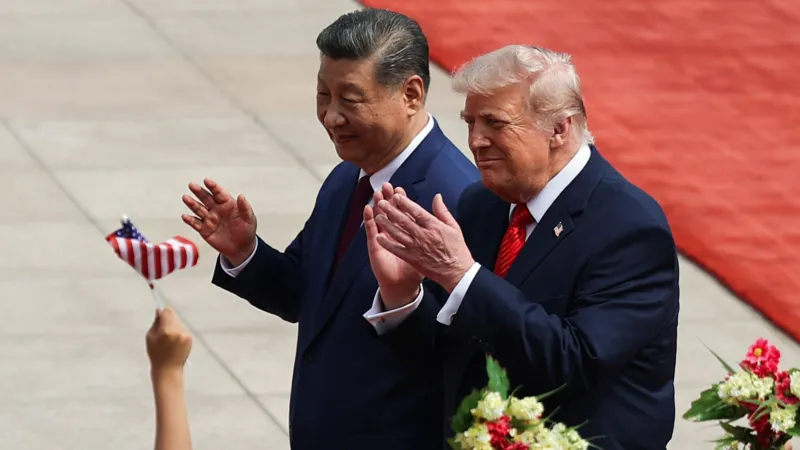 Trump Visit to China Focuses on Trade Tensions and Taiwan Warning