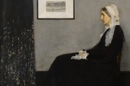 Whistler’s Mother: Why a Quiet Portrait Became a Global Icon A painting that was never meant to be famous “Whistler’s Mother” is one of the most recognized artworks in the world today. The painting’s real title is Arrangement in Grey and Black: Portrait of the Painter’s Mother (1871). It is now being shown at Tate Britain as part of a major exhibition on James Abbott McNeill Whistler. The portrait shows Whistler’s mother seated in a simple, calm pose. At the time it was created, no one expected it to become a cultural icon. An unexpected beginning The painting came together by chance. In late 1871, Whistler’s usual model could not attend a sitting due to illness. His mother, Anna McNeill Whistler, stepped in reluctantly. She later reflected on the moment and saw it as meaningful, writing that disappointments can sometimes lead to good outcomes. Whistler was living in London at the time and working steadily as an artist. The portrait was not planned as a major work. It was one of many pieces he created during that period. Near destruction and early rejection The painting almost did not survive its early years. It was nearly destroyed in a train fire in 1871. Later, it also faced rejection risks from the Royal Academy exhibition in 1872. It only made it into the show after support from Whistler’s friend Sir William Boxall. Even after it was displayed, public reaction was weak. Critics and viewers did not respond with enthusiasm. The work had a difficult start in the art world. Why critics did not understand it At the time, Victorian audiences preferred clear stories in art. They liked paintings based on history, mythology, or literature. Whistler worked differently. He used simple titles like “harmony,” “nocturne,” and “symphony.” These did not explain the subject clearly, which confused many viewers. Because of this, his work often faced criticism. People expected storytelling, but Whistler focused more on mood, form, and arrangement. From rejection to global fame Despite early criticism, Whistler’s Mother slowly gained recognition. Over time, it became one of the most reproduced artworks in modern culture. It has appeared in cartoons like Donald Duck, TV shows such as The Simpsons, and even in literary references like Nabokov’s Lolita. Its image moved far beyond the art world and entered popular culture. What once seemed like a simple portrait became a symbol of calm, discipline, and tradition. Why Whistler might not have liked its success Whistler often resisted how the public interpreted his work. He focused on artistic balance and composition rather than meaning or storytelling. The massive fame of this single painting likely frustrated him. It overshadowed much of his wider body of work, which he considered more important.