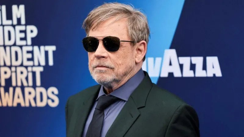 Mark Hamill faces White House backlash after sharing an AI generated Trump grave image post, later deleting it and clarifying his political intent.