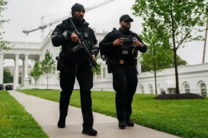 White House Gunman Had Previous Encounters With Secret Service Before Deadly Shooting A gunman who opened fire near the White House on Saturday had already faced multiple encounters with the Secret Service in the past year, according to court records. The suspect, identified as Nasire Best, allegedly fired several shots near a Secret Service checkpoint outside the White House. Officers quickly responded and shot the suspect during the incident. Authorities later confirmed that he died at a nearby hospital. A bystander also suffered injuries during the shooting, while no Secret Service officers were harmed. Officials said former President Donald Trump was inside the White House at the time but remained safe. Suspect Previously Tried To Access White House Court documents reveal that Best had earlier encounters with security officials in 2025. In June 2025, he reportedly blocked a White House entry lane and told Secret Service agents that he was Jesus Christ. During that incident, he also asked authorities to arrest him. Officers later sent him for a mental health evaluation. Just one month later, in July 2025, Best again attempted to enter a federally restricted area near the White House. Secret Service agents arrested him and charged him with unlawfully entering a protected property. Although the court released him after arraignment, he later failed to appear for a scheduled hearing in August 2025. That absence led the court to issue a no bond bench warrant for his arrest. Shooting Happened Near Secret Service Checkpoint Authorities said the shooting happened around 6:00 PM EST near the intersection of 17th Street and Pennsylvania Avenue NW, close to the Eisenhower Executive Office Building. Witnesses and reporters covering events outside the White House quickly ran for safety after hearing gunshots. Secret Service officers stationed at the checkpoint immediately returned fire after the suspect opened fire. Emergency teams rushed the suspect to the hospital, where doctors later pronounced him dead. Officials confirmed that security operations at the White House continued without disruption despite the shooting. Trump Praises Secret Service Response Following the incident, Trump thanked law enforcement officers and Secret Service agents for their rapid response. He praised their professionalism and said their quick action prevented further danger near the White House complex. The shooting also raised fresh concerns about security around the White House, especially after another gun related incident interrupted the White House Correspondents’ Dinner just one month earlier.
