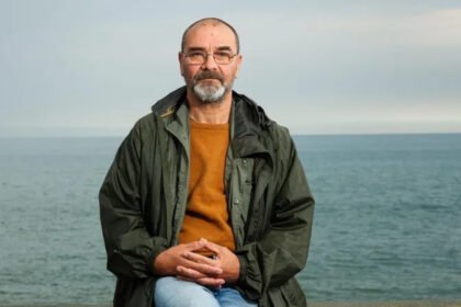 Andrew Malkinson Says Legal Fee Demand After Wrongful Conviction Feels “Vindictive” Andrew Malkinson Criticises Compensation Process Andrew Malkinson has urged the UK government to step in after being asked to cover legal costs from the compensation awarded for his wrongful rape conviction. He said the decision feels unfair after spending nearly two decades behind bars for a crime he did not commit. Malkinson explained that officials may deduct legal fees and expert costs from his compensation payment. According to him, the amount could reach up to £10,000. He described the move as “penny pinching” and questioned why the state was not covering the expenses. For more than 20 years, Malkinson lived under the shadow of a conviction linked to a brutal 2003 attack in Greater Manchester. He served over 17 years in prison before his conviction was overturned in one of the UK’s most serious miscarriages of justice. “The State Caused the Damage,” Says Malkinson Speaking about the issue, Malkinson said the government should accept responsibility for the costs connected to the case. He argued that the authorities caused the injustice, so they should also pay the legal and expert fees required to clear his name. He also called on Justice Secretary David Lammy to resolve the issue quickly. Malkinson said the matter could be fixed immediately if the government chose to act. The Ministry of Justice responded by saying the miscarriage of justice compensation scheme exists to help people rebuild their lives. Officials added that the maximum compensation amount increased by 30% last year to £1.3 million. The department also confirmed that the Law Commission is reviewing rules related to criminal appeals and compensation cases. Authorities said they would carefully study the findings once the consultation process ends. Real Attacker Convicted After Years of Suffering Malkinson spoke publicly after the conviction of 52 year old Paul Quinn, who was recently found guilty of rape, strangulation, and grievous bodily harm connected to the same attack. Although relieved that the real offender had finally been convicted, Malkinson admitted the case still brought strong emotions. He said anger returned because he carried the blame and punishment for many years despite no DNA evidence linking him to the crime. At the time Quinn was convicted, Malkinson was visiting ancient ruins in Rome, Italy. He reflected on the years of suffering experienced by both himself and the victim. He also said he often wondered how the victim must feel after the truth finally came out. Malkinson stressed that he spent years serving “somebody else’s punishment.” His case continues to raise serious questions about the justice system and the long term impact of wrongful convictions.