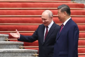 Xi Jinping Strengthens Global Influence During Visits From Trump and Putin China Emerges as a Key Global Power Chinese President Xi Jinping has once again placed China at the center of global diplomacy after hosting both Donald Trump and Vladimir Putin within days of each other in Beijing. Both leaders received grand state welcomes featuring military honor guards, marching bands, cannon salutes, and cheering children outside the Great Hall of the People. The carefully planned ceremonies reflected China’s growing confidence on the world stage. By welcoming two major world leaders back to back, Xi aimed to show that China now plays a central role in international politics and global decision making. China Expands Its Diplomatic Influence China’s leadership believes its economic strength and expanding diplomatic reach have increased its importance in world affairs. Analysts say Beijing is no longer operating in the shadow of Western powers and is now shaping global conversations more directly. Experts also believe China prefers a slow and calculated approach rather than openly interfering in conflicts. Instead of taking aggressive action, Beijing uses its economic influence and international partnerships to strengthen its position over time. Putin Depends More on China The meeting between Xi and Putin highlighted the growing partnership between China and Russia. Putin has visited China many times over the years and shares a close working relationship with Xi. However, Russia’s long war in Ukraine and continued Western sanctions have increased Moscow’s dependence on Beijing. China has become Russia’s biggest trading partner and one of its largest buyers of oil and gas. Although the two countries signed more than 20 agreements covering trade and technology, China still did not approve the major Russian gas pipeline project that Moscow has pushed for years. This showed that Beijing currently holds stronger negotiating power in the relationship. Analysts believe Russia now needs China more than China needs Russia, especially as Moscow faces economic and political pressure from the West. Xi Holds Strong Position in Talks With Trump Xi also appeared confident during discussions with Trump. China’s strong manufacturing sector, expanding trade relationships, and control over rare earth minerals have given Beijing greater leverage in global negotiations. Political observers say the balance of power between Washington and Beijing has shifted in recent years. China now has the ability to negotiate with the United States on more equal terms. At the same time, both Trump and Putin arrived in Beijing while facing difficult international crises. Trump continues to deal with tensions in the Middle East that have affected his political standing, while Putin remains deeply involved in the Ukraine war, which has isolated Russia globally. China Sets the Tone in Global Politics The recent high profile visits demonstrated how China is becoming more influential in shaping international relations. Xi appeared confident and in control during both meetings, reinforcing the idea that Beijing now plays a leading role in global diplomacy. As major powers face ongoing political and economic challenges, China is increasingly positioning itself as a country capable of influencing global decisions, trade, and strategic partnerships.