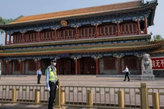 Trump Visits Zhongnanhai During High Profile Beijing Summit With Xi Jinping Rare Tour Highlights Growing Diplomatic Warmth Between China and the US US President Donald Trump wrapped up his Beijing visit with a rare tour of Zhongnanhai, the highly secured compound that serves as the political center of China’s leadership. Chinese President Xi Jinping personally guided Trump through the historic site during the final moments of their two day summit in Beijing. The visit attracted global attention because Zhongnanhai is normally closed to foreign visitors. Located near Tiananmen Square, the centuries old compound functions as the main residence and workplace for China’s top Communist Party officials. Originally built during the 14th Century as a royal retreat for Chinese emperors, Zhongnanhai later became the headquarters of China’s Communist government after 1949. Today, it remains one of the country’s most important political locations. Xi Jinping Gives Trump a Personal Tour During the walk through the gardens and lakes of Zhongnanhai, Trump admired the carefully maintained landscape and ancient trees. He reportedly praised the roses inside the compound, calling them some of the most beautiful flowers he had ever seen. Xi responded warmly and promised to send Trump seeds from the Chinese roses they viewed together. Trump welcomed the gesture and described it as “great.” The Chinese president also pointed out several historic trees inside the compound that are estimated to be between 200 and 400 years old. Trump appeared surprised by their age, while Xi added that China is home to trees that are over 1,000 years old. Zhongnanhai Visit Seen as Symbolic Gesture Political analysts view the invitation as a strong diplomatic signal from Beijing. Access to Zhongnanhai is extremely limited, and Chinese leaders rarely host foreign officials there. While speaking with Trump, Xi explained that visits by foreign leaders to the compound are “extremely rare.” He mentioned that Russian President Vladimir Putin had previously visited the site. Belarusian President Alexander Lukashenko also toured the compound last year. Several former US presidents have entered Zhongnanhai in the past, including Barack Obama, George W. Bush, and Richard Nixon during his historic 1972 trip to China. Summit Focused on Trade and Global Tensions The Beijing summit took place at a sensitive time for relations between Washington and Beijing. Trade disagreements and concerns surrounding the Iran conflict had increased tensions between both countries in recent months. Despite those issues, both leaders maintained a positive tone throughout the visit. Trump described the trip as “incredible,” while Xi spoke about building a “new bilateral relationship” between the two global powers. Although the summit featured major ceremonial moments and strong public messaging, neither side released detailed policy agreements following the talks.