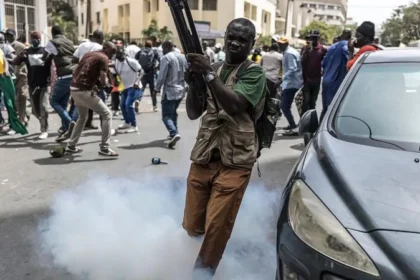 Senegal Lawmakers Approve Constitutional Reforms Amid Growing Political Tensions Senegal's parliament has approved a controversial package of constitutional reforms that would increase the powers of lawmakers while limiting some presidential authority. The decision has sparked political tensions and street protests, as critics claim the changes are driven by political rivalry rather than democratic reform. The reforms were passed with a large majority after a heated debate in parliament. Demonstrators gathered outside the National Assembly to protest the proposed constitutional changes, while opposition lawmakers staged a walkout during the session. Political Alliance Turns Into Power Struggle President Bassirou Diomaye Faye and parliamentary Speaker Ousmane Sonko came to power together in 2024 after promising major political and economic reforms. However, their relationship has steadily deteriorated over the past several months. The disagreement intensified after Sonko publicly criticized President Faye's handling of Senegal's economic and debt challenges. In May, President Faye removed Sonko from the position of prime minister. Soon afterward, lawmakers from the ruling Pastef party elected Sonko as Speaker of the National Assembly, giving him significant influence over parliament. Key Constitutional Changes The proposed constitutional reforms would strengthen the role of parliament and increase oversight of government decisions. The main proposals include: Expanding the investigative powers of parliamentary committees. Requiring the government to present agreements involving natural resources to parliament. Replacing the current Constitutional Council with a new Constitutional Court consisting of nine members instead of seven. Preventing a sitting president from leading a political party while serving in office. Restricting a president from signing certain laws between a presidential election and the inauguration of the newly elected president. Supporters argue these measures will improve the balance of power among the executive, legislative, and judicial branches of government. Opposition Raises Concerns Opposition parties and civil society organizations strongly oppose the reforms. They argue that the changes are politically motivated and designed to weaken President Faye while increasing the influence of Speaker Sonko and the parliamentary majority. Outside parliament, police used tear gas to disperse protesters who had gathered to oppose the constitutional amendments. The demonstrations reflected growing public concern over Senegal's political future. Referendum Planned Justice Minister Moussa Sarr announced that President Faye intends to submit the constitutional reforms to a national referendum. However, no official voting date has been announced. Speaker Sonko questioned whether the president has the authority to organize a referendum after parliament had already approved the amendments with a majority vote. The debate has created fresh uncertainty in Senegal's political landscape, with both supporters and critics waiting to see whether the proposed reforms will receive public approval in a nationwide vote. What Happens Next? The constitutional reforms are expected to remain at the center of Senegal's political debate in the coming months. If the referendum moves forward, voters will decide whether the proposed changes become part of the country's constitution. The outcome could significantly reshape the balance of power between the presidency and parliament.