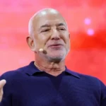 AI will create more jobs, not replace workers, says Jeff Bezos AI will increase labour demand, Bezos says Amazon founder Jeff Bezos has said artificial intelligence will not replace large numbers of workers. Instead, he believes it will increase demand for human labour and create new types of jobs. Speaking at a tech conference in Paris, Bezos said fears about mass job losses are overstated. He argued that AI will remove limits on what people can do and open up fresh opportunities across industries. He said many people worry that AI will make workers unnecessary. However, he disagrees and believes the world may actually face a shortage of labour as new work emerges. Debate over AI and job security Bezos’ comments come at a time when concerns about AI’s impact on employment are growing. Some political and tech leaders, including former UK prime minister Rishi Sunak, have warned that AI could reduce job prospects, especially for younger workers. The UK’s Trades Union Congress has also raised concerns. It warned that AI could repeat the impact of deindustrialisation, where profits rise but many jobs become less secure or disappear. At the same time, it noted that AI could still bring major benefits if it is developed in a fair way and productivity gains are shared with workers. Bezos highlights physical AI and manufacturing Bezos also spoke about his new AI venture, Prometheus, which focuses on improving physical manufacturing. He said automation in this sector is growing quickly, but still needs human input and oversight. He suggested that AI will not fully replace industrial workers. Instead, it will reshape how production systems work and create demand for new skills. Long term vision for space and the Moon At the same event, Bezos shared his long term vision for space exploration. He described space as limited by supply rather than demand and said access is the main barrier to expansion. He said the Moon could become the first step in building a permanent human presence beyond Earth. Technologies like electrolysis could one day help extract and use lunar resources for fuel and long term missions. “We are going to the Moon to stay, not just to visit,” he said. Blue Origin updates and rocket setback Bezos also discussed his space company Blue Origin. He addressed a recent explosion during a ground test of the New Glenn rocket in Florida. No one was injured, but the incident damaged parts of the launch system. He said the team learned important lessons from the failure and managed to preserve key infrastructure, which will help speed up recovery. Blue Origin CEO Dave Limp said repairs are already underway. The company expects launches to resume before the end of the year as it competes with SpaceX in the commercial space race.