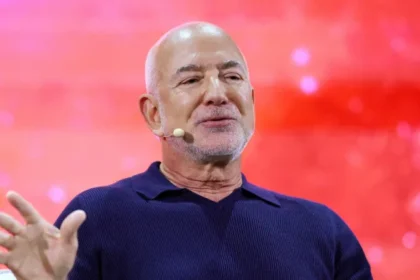 AI will create more jobs, not replace workers, says Jeff Bezos AI will increase labour demand, Bezos says Amazon founder Jeff Bezos has said artificial intelligence will not replace large numbers of workers. Instead, he believes it will increase demand for human labour and create new types of jobs. Speaking at a tech conference in Paris, Bezos said fears about mass job losses are overstated. He argued that AI will remove limits on what people can do and open up fresh opportunities across industries. He said many people worry that AI will make workers unnecessary. However, he disagrees and believes the world may actually face a shortage of labour as new work emerges. Debate over AI and job security Bezos’ comments come at a time when concerns about AI’s impact on employment are growing. Some political and tech leaders, including former UK prime minister Rishi Sunak, have warned that AI could reduce job prospects, especially for younger workers. The UK’s Trades Union Congress has also raised concerns. It warned that AI could repeat the impact of deindustrialisation, where profits rise but many jobs become less secure or disappear. At the same time, it noted that AI could still bring major benefits if it is developed in a fair way and productivity gains are shared with workers. Bezos highlights physical AI and manufacturing Bezos also spoke about his new AI venture, Prometheus, which focuses on improving physical manufacturing. He said automation in this sector is growing quickly, but still needs human input and oversight. He suggested that AI will not fully replace industrial workers. Instead, it will reshape how production systems work and create demand for new skills. Long term vision for space and the Moon At the same event, Bezos shared his long term vision for space exploration. He described space as limited by supply rather than demand and said access is the main barrier to expansion. He said the Moon could become the first step in building a permanent human presence beyond Earth. Technologies like electrolysis could one day help extract and use lunar resources for fuel and long term missions. “We are going to the Moon to stay, not just to visit,” he said. Blue Origin updates and rocket setback Bezos also discussed his space company Blue Origin. He addressed a recent explosion during a ground test of the New Glenn rocket in Florida. No one was injured, but the incident damaged parts of the launch system. He said the team learned important lessons from the failure and managed to preserve key infrastructure, which will help speed up recovery. Blue Origin CEO Dave Limp said repairs are already underway. The company expects launches to resume before the end of the year as it competes with SpaceX in the commercial space race.