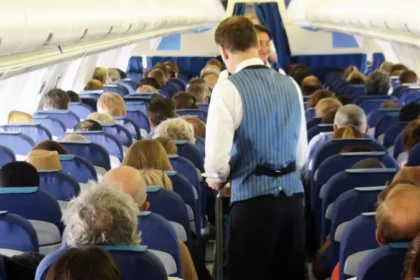 # UK Government Considers National Airline Blacklist for Disruptive Passengers The UK government is exploring plans to create a national airline blacklist that could stop abusive and disruptive passengers from flying with any UK carrier. The proposal aims to improve passenger safety and support airline staff by preventing repeat offenders from switching airlines after receiving a ban from one company. Officials from the Department for Transport are expected to meet with airline representatives this month to discuss how the system could work. ## Why the New Proposal Is Being Considered Airlines often face challenges with disruptive travelers, especially during the busy summer holiday season. Incidents involving aggressive behavior, intoxication, and verbal abuse can put passengers and crew members at risk. Currently, when an airline bans a passenger for misconduct, that individual can often book a flight with another carrier. The proposed national database would help airlines share information and take coordinated action against repeat offenders. Government officials believe stronger cooperation between airlines could reduce onboard disturbances and create a safer travel environment for everyone. ## Safety Concerns Continue to Grow Disruptive behavior on flights remains a serious issue across the aviation industry. Airline crews regularly deal with passengers who become aggressive, intoxicated, or refuse to follow safety instructions. Such incidents can delay flights, force emergency landings, and create unnecessary stress for travelers. In severe cases, airlines and authorities pursue criminal charges against offenders. The government says it wants to ensure passengers can travel safely without facing disturbances caused by a small number of individuals. ## Recent Cases Highlight the Problem Several high profile incidents have brought attention to the issue. In one case, a passenger became so abusive during a flight from Krakow to Bristol that the pilot had to abandon the aircraft's first landing attempt. The passenger later received a prison sentence. Another incident involved a fight between two passengers on a flight traveling from Turkey to Manchester. The confrontation forced the aircraft to make an emergency landing in Brussels, where authorities arrested those involved. The airline later imposed lifetime bans on both passengers. These cases demonstrate the significant impact disruptive behavior can have on flight operations and passenger safety. ## Airlines Support Stronger Measures Many airlines have welcomed the proposal. Industry leaders argue that a national blacklist would strengthen existing efforts to tackle disruptive conduct. Airlines already enforce strict policies and issue lifetime bans in serious cases. However, they believe a shared database would make these penalties more effective by preventing offenders from simply choosing another carrier. The aviation industry hopes the proposed system will discourage poor behavior and help create a safer experience for passengers and crew members alike. ## Data Protection Challenges Remain While the proposal has gained support, questions remain about data protection and privacy regulations. Current GDPR rules limit how airlines can share passenger information. Government officials and industry representatives will need to determine how a national database could operate while complying with existing privacy laws. Further discussions are expected as the government and airlines explore practical solutions. ## What Happens Next? The Department for Transport will continue discussions with airlines in the coming weeks. If approved, the scheme could become a major step toward reducing disruptive behavior on flights and improving safety across the UK's aviation sector. For now, airlines and government officials remain focused on finding a solution that protects passengers, supports crew members, and maintains compliance with data protection regulations.